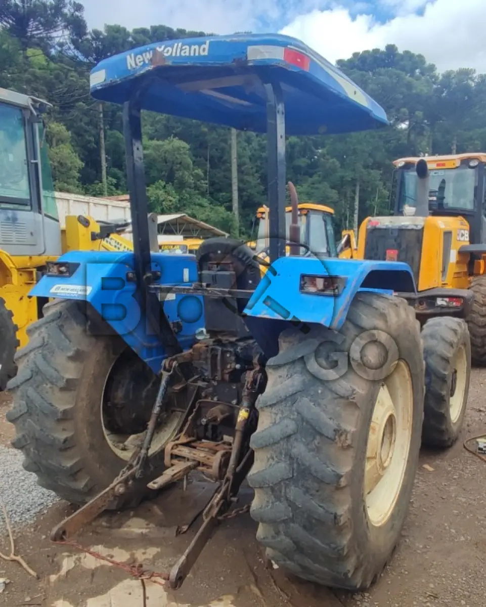 LOTE 013 - Trator Agricula de rodas, New Holland, Modelo: TT 75