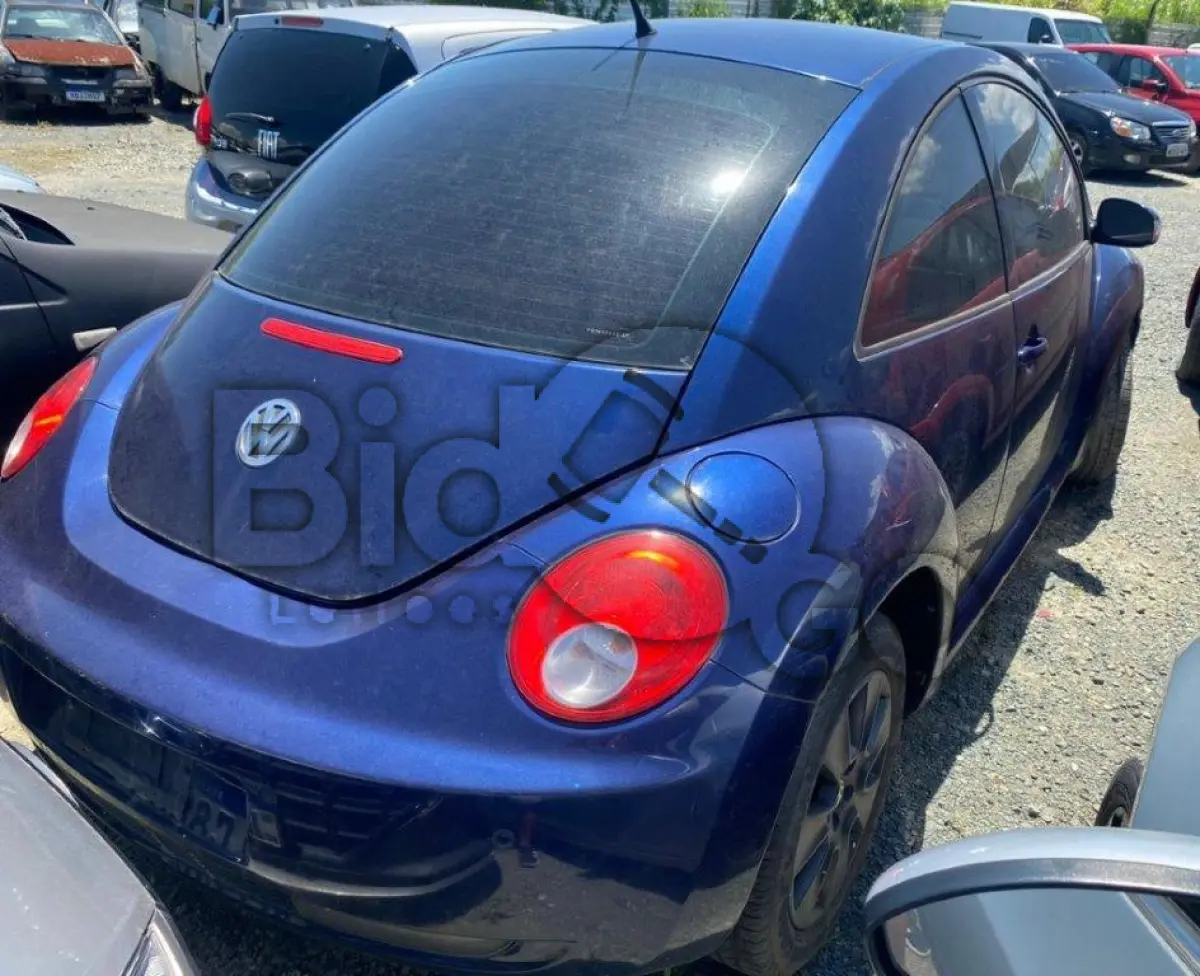 LOTE 037 - Espécie: PASSAGEIRO / Marca: I / Modelo: VW BEETLE / Placa: EJE8973 / UF: SC / Município: Itajaí / Ano fabricação: 2009 / Ano modelo: 2009 / Cor: AZUL / Chassi: 3VWSJ21C49M516184 / Motor: CBP122583 / RENAVAM: 00150725477