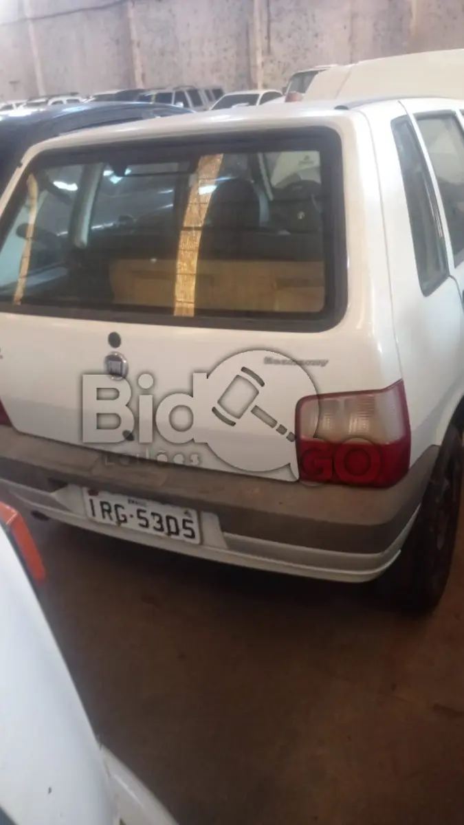 LOTE 008 - FIAT/UNO MILLE ECONOMY, Ano/modelo: 2010/2011, Placa: IRG5305, Chassi: 9BD15822AB6516088, RENAVAM: 255299494, Tipo: Automóvel, Cor: Branca, Espécie: Passageiro, Motor: 146E1011*9756658