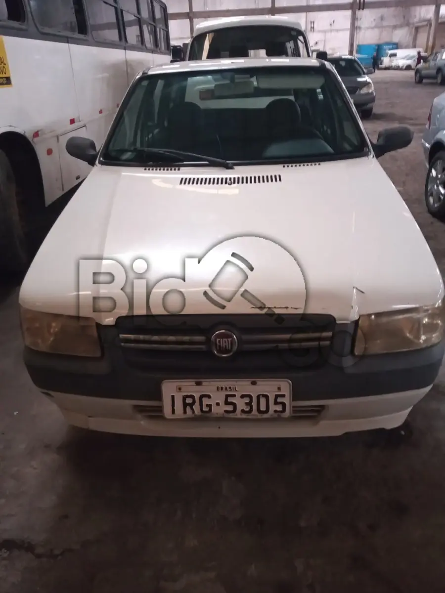LOTE 008 - FIAT/UNO MILLE ECONOMY, Ano/modelo: 2010/2011, Placa: IRG5305, Chassi: 9BD15822AB6516088, RENAVAM: 255299494, Tipo: Automóvel, Cor: Branca, Espécie: Passageiro, Motor: 146E1011*9756658