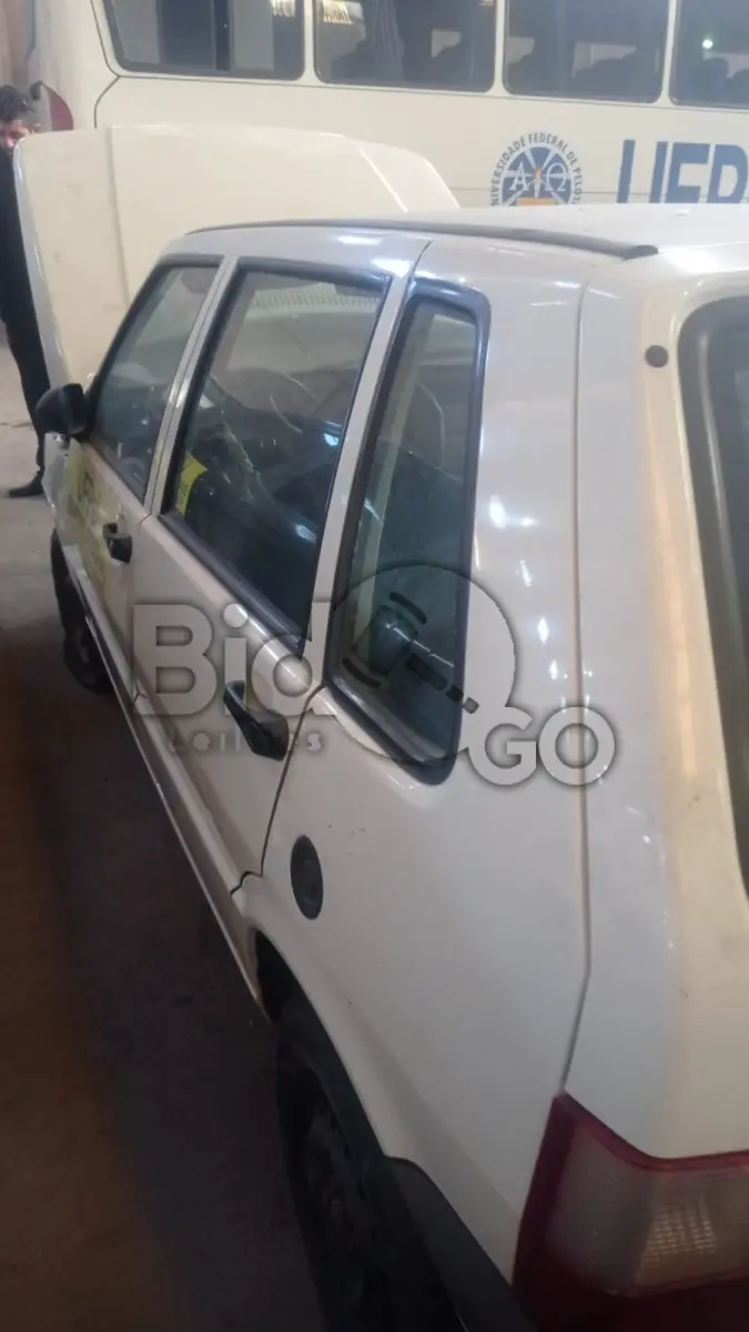 LOTE 008 - FIAT/UNO MILLE ECONOMY, Ano/modelo: 2010/2011, Placa: IRG5305, Chassi: 9BD15822AB6516088, RENAVAM: 255299494, Tipo: Automóvel, Cor: Branca, Espécie: Passageiro, Motor: 146E1011*9756658