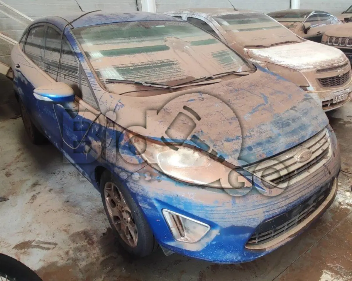 LOTE 003 - Espécie: AUTOMOVEL / Marca: I / Modelo: FORD FIESTA SE / Placa: NXC3257 / UF: RS / Município: Novo Hamburgo / Ano fabricação: 2011 / Ano modelo: 2011 / Cor: AZUL Chassi:3FADP4BK8BM211133 Motor: BM211133 / RENAVAM: 337443513 *AFETADO POR ENCHENTE