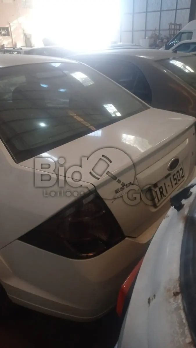 LOTE 017 - FORD/FIESTA SEDAN1.6FLEX, Ano/modelo: 2010/2011, Placa: IRI1502, Chassi: 9BFZF54P0B8119056, RENAVAM: 258399856, Tipo: Automóvel, Cor: Branca, Espécie: Passageiro, Motor: QF9AB8119056