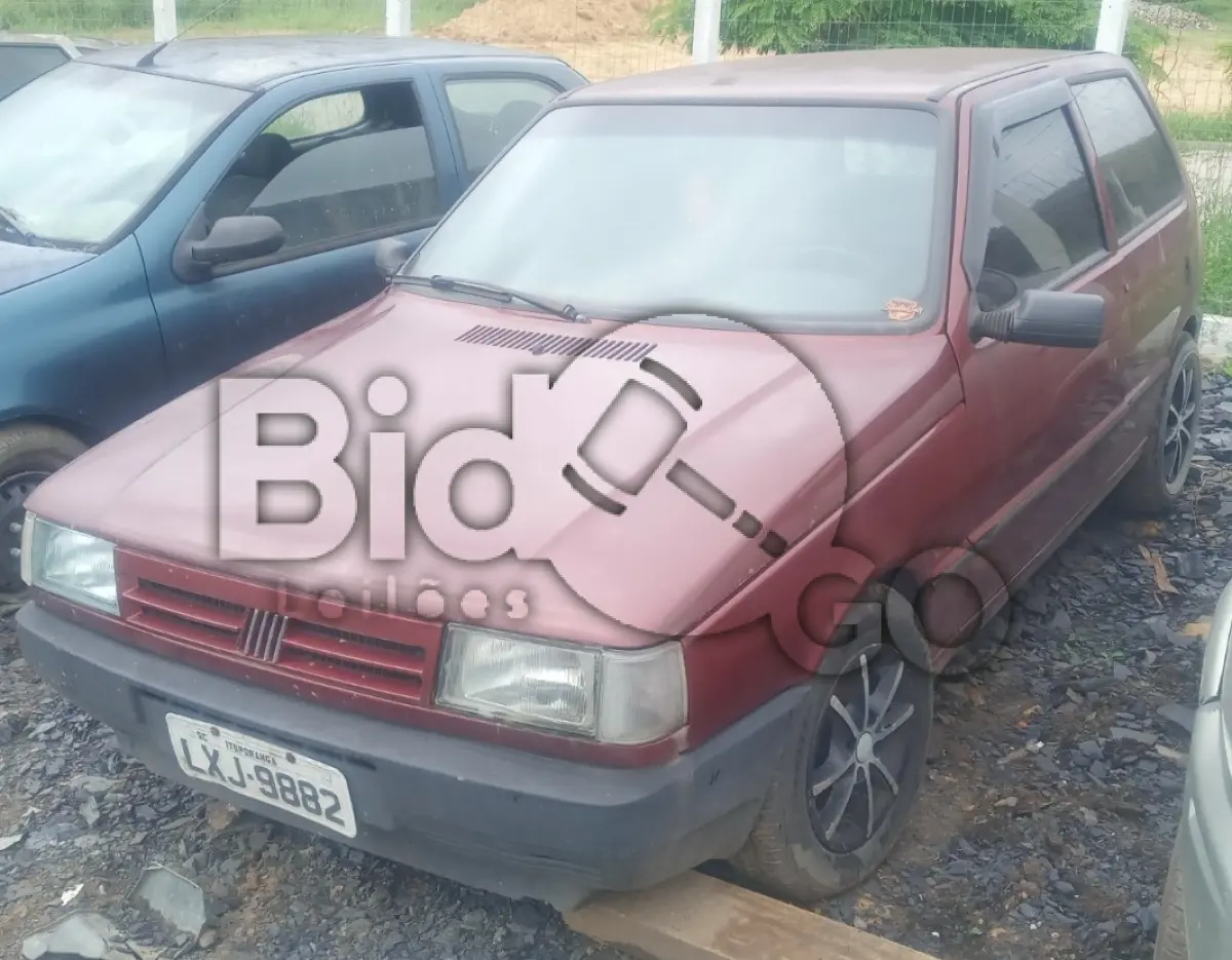 LOTE 027 - Espécie: PASSAGEIRO / Marca: FIAT / Modelo: UNO MILLE IE / Placa: LXJ9882 / UF: SC / Município: Ituporanga / Ano fabricação: 1995 / Ano modelo: 1996 / Cor: VERMELHA / Chassi: 9BD146067S5630362 / Motor:146A70114451445 RENAVAM: 00648119742