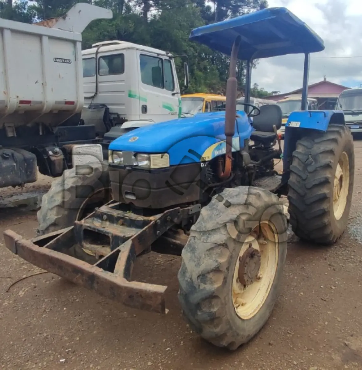 LOTE 013 - Trator Agricula de rodas, New Holland, Modelo: TT 75